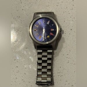 Stauer Mens Regatta Yacht Racing Flag Blue Face Silver tone Watch 24580 vintage